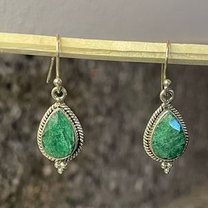 100% Sterling Silver with Antique Setting